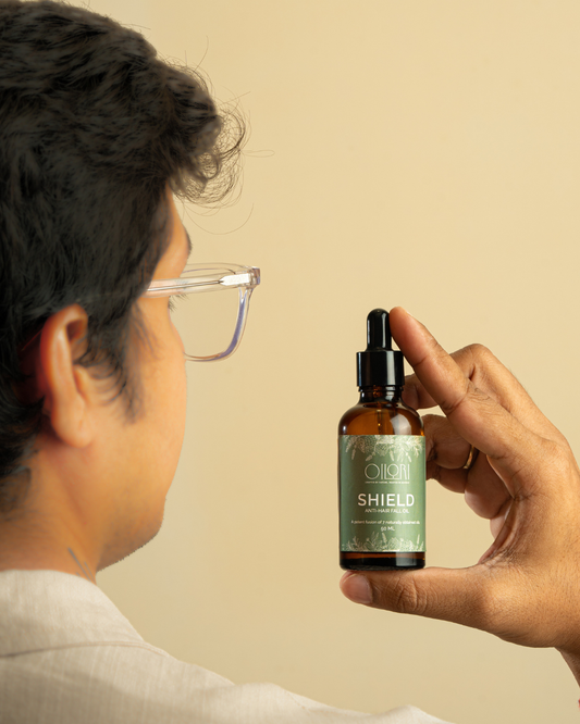 Oilori Shield Anti-Hair Fall Oil used in scalp massage for stronger hair and reduced shedding