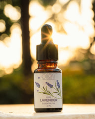 Oilori 20ml Bottle of pure lavender essential oil with a dropper on a blurred natural background