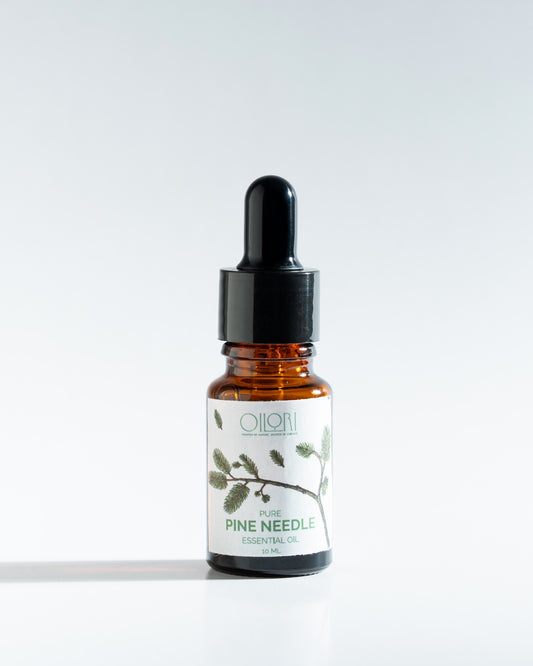 Oilori 10ml bottle of pure pine needle essential oil with dropper on a white background.